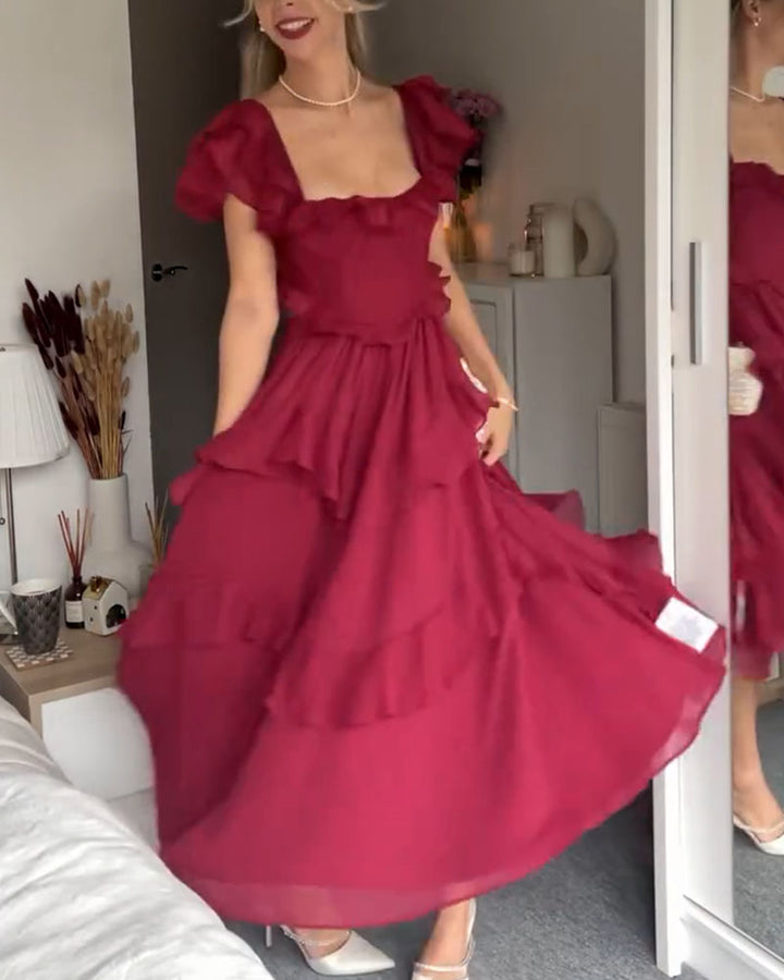 ISABELLA – ROMANTISCHE CASCADE RUFFLE JURK