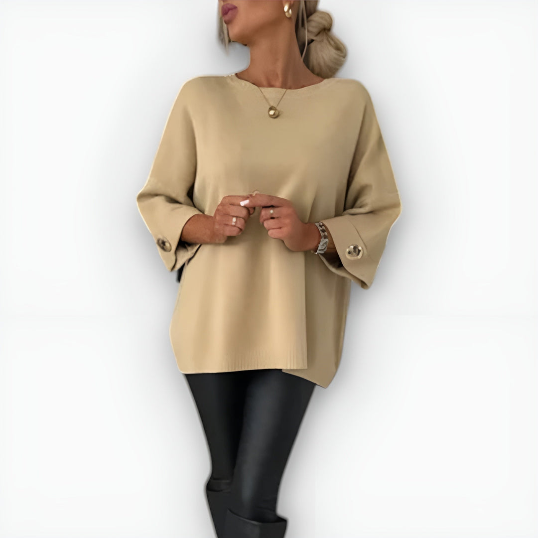 LEAH – OVERSIZED TRUI MET KNOPEN OP DE MANCHET