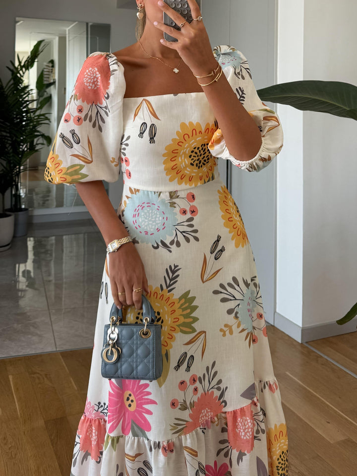 CAMILLE – BLOEIENDE ELEGANTIE JURK MET PUFFMOUWEN